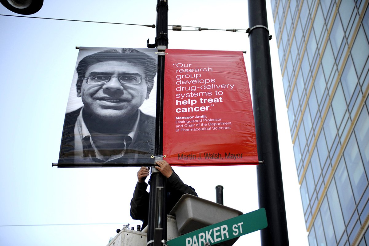 The Faces of North­eastern are popping 
up all over campus 📷 <a href="/modoonophoto/">Matthew Modoono</a> bit.ly/1pdWVwJ