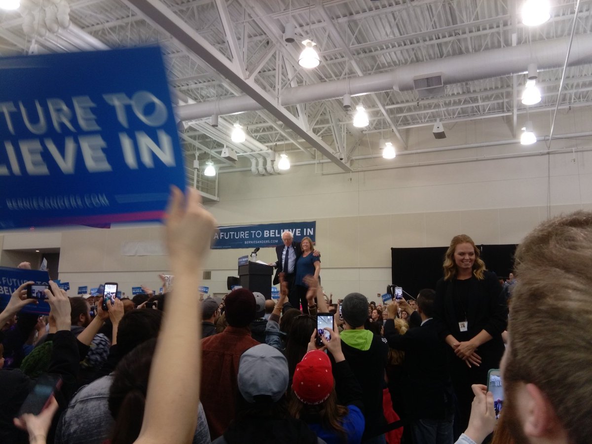 ErieForBernie's tweet photo. .@KST4Congress running to unseat @CongressmanGT in #PA05 is spotted behind the podium. #BernieInErie #PAprimary https://t.co/xwEi9Isa3G