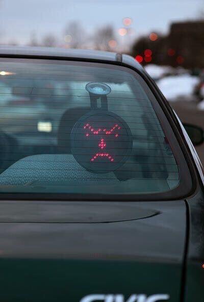 It goes on your back windshield &amp; you have a control upfront that lets you send messages to people behind you.