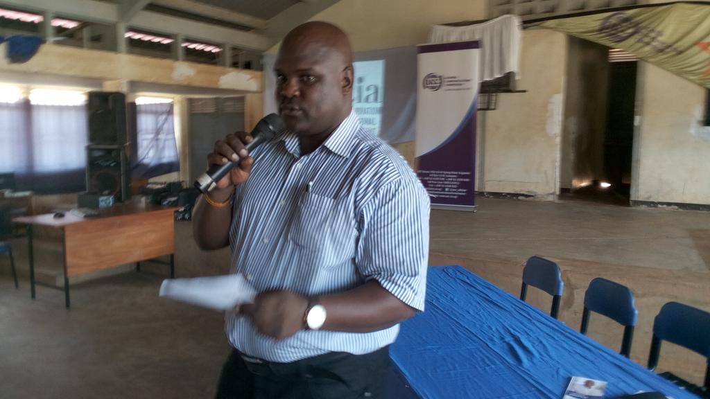 1985Imani's tweet photo. Joseph Kizito from @UCC_Official  consumer affairs, opening the ACIA event! https://t.co/hnuGOTkR4o