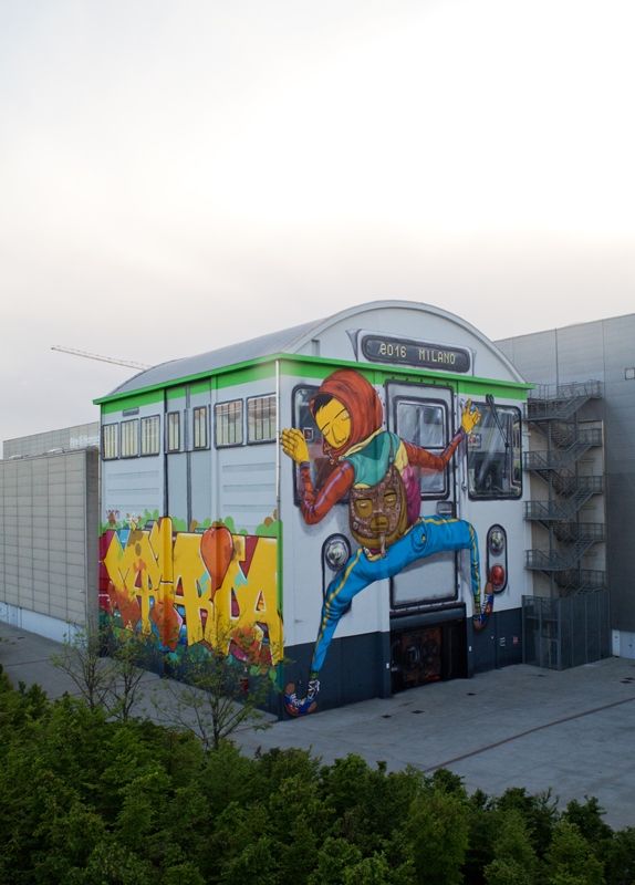 AltriMondiGazza's tweet photo. All'@hangarbicocca di Milano si inaugura stasera il murales di @OsGemeos per il progetto #OutsidetheCube. https://t.co/s1QRDAzH27