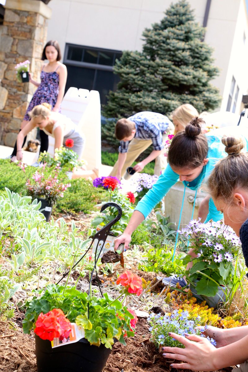 carolinaday's tweet photo. CDS Upper School students planting flowers for Gardening Day during Earth Week. #CDSEarthWeek https://t.co/NzJ40W5mHG