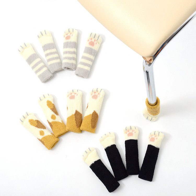 LaughingSquid's tweet photo. Cute Knitted Socks That Look Like Cat Paws and Slip on Over the Feet of Chairs https://t.co/Bd523hWSAt https://t.co/1d1CiKJZZs