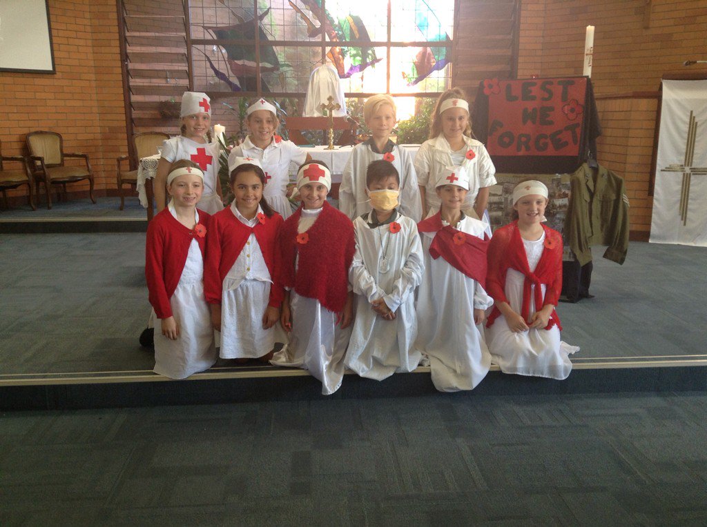 SIPSyear4's tweet photo. #SIPS4A and #sips4b lead mass today to commemorate ANZAC Day! https://t.co/UyY8vjG2Z8