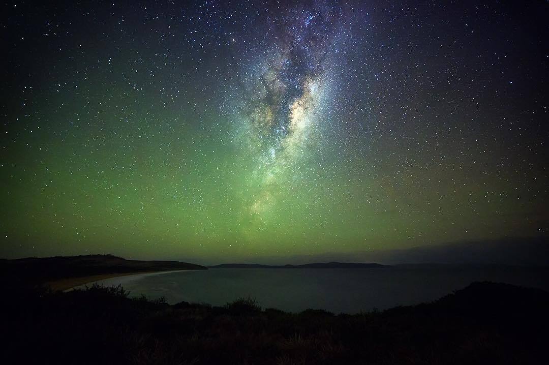 tasmania's tweet photo. The Milky Way stars over @HobartandBeyond's South Arm Peninsula (Pic: IG/James.Garlick) #discovertasmania @Australia https://t.co/uPz6xYWq2N
