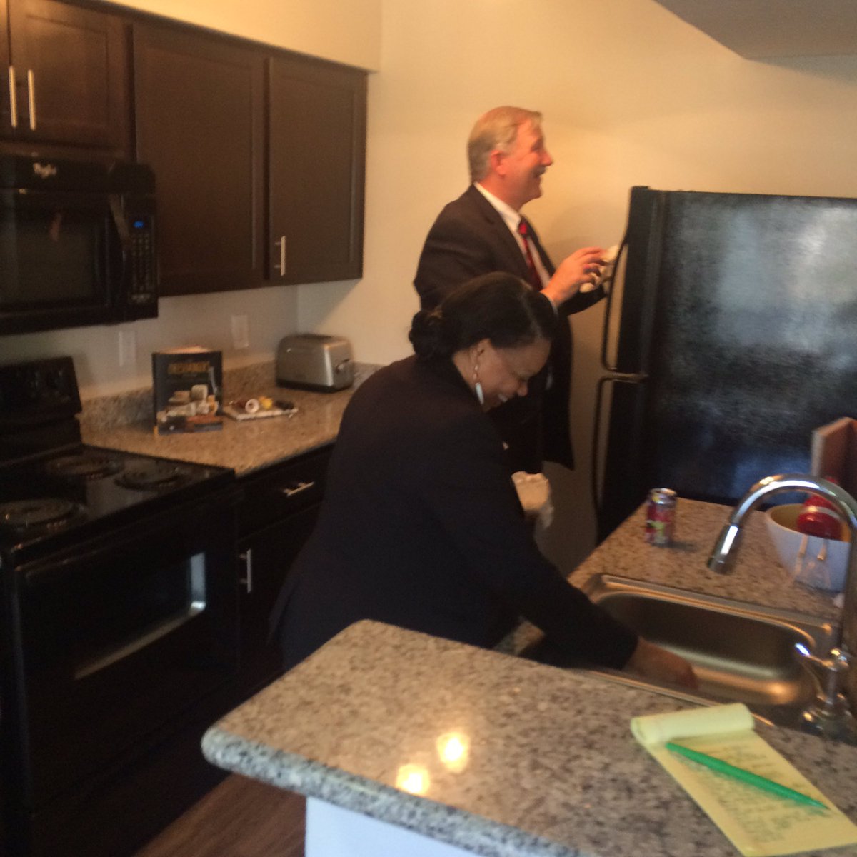 WheatleyDebbie's tweet photo. Now that's what I call teamwork!  CEO Mark Poston cleaning the top of a refrigerator. @CShaw_Resource https://t.co/hIdz33O8Tn
