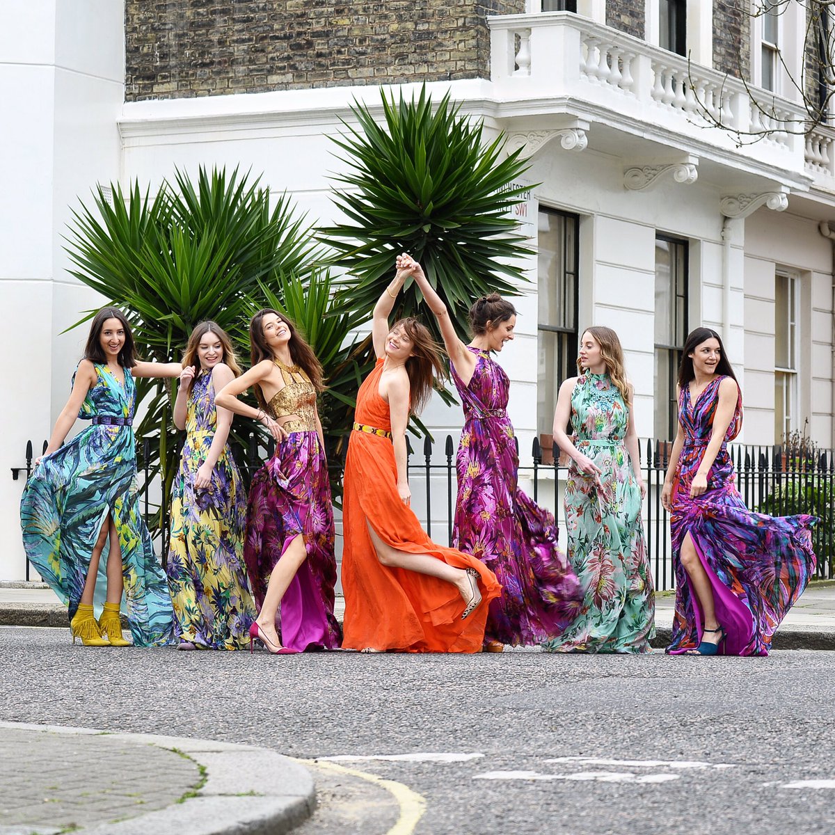 AnisaSojka's tweet photo. If all the colors of the rainbow morphed into a vibrant girl band @MWWorld πππ #ohMW #GownGang https://t.co/CXcsXDsjY3
