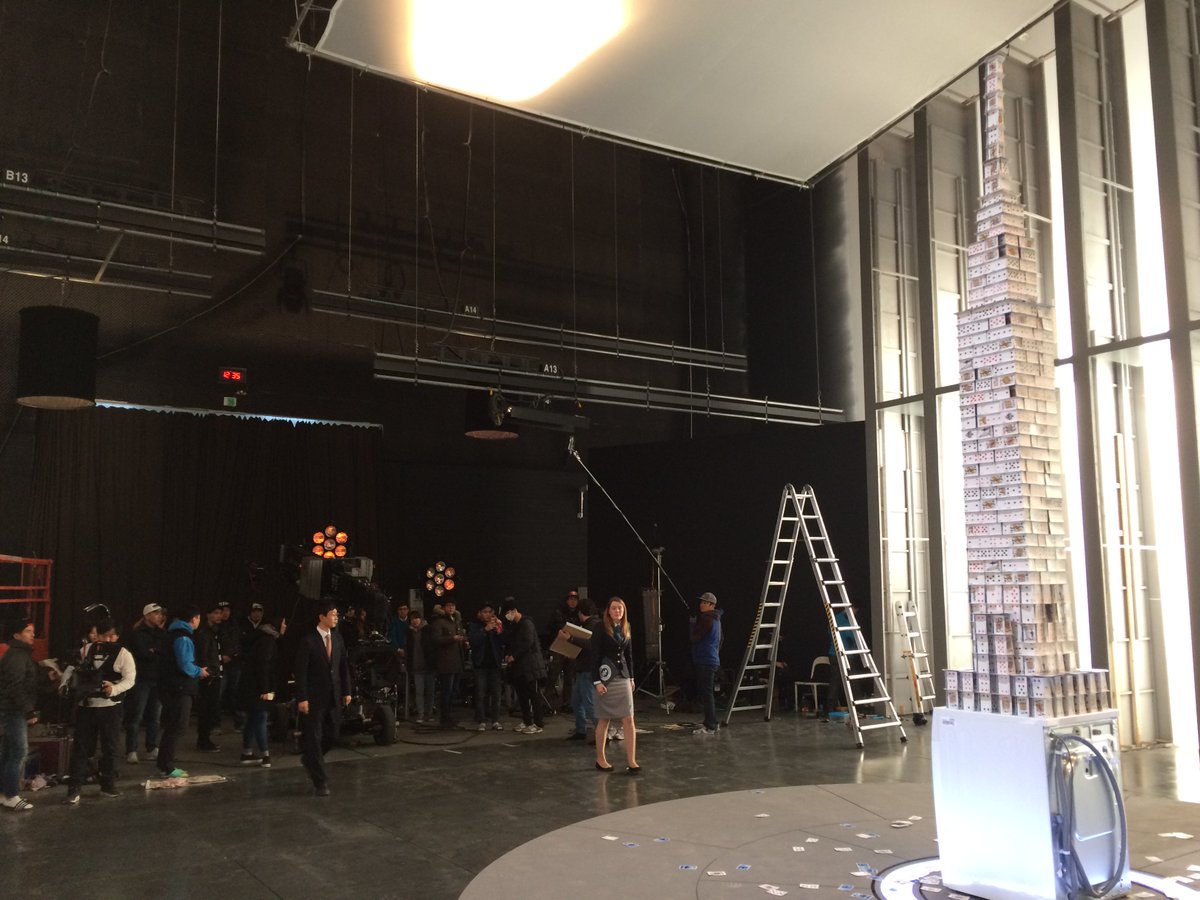 Tallest house of cards built in 12 hours on top of a new LG washing machine, while it was running at 1,000 RPM.