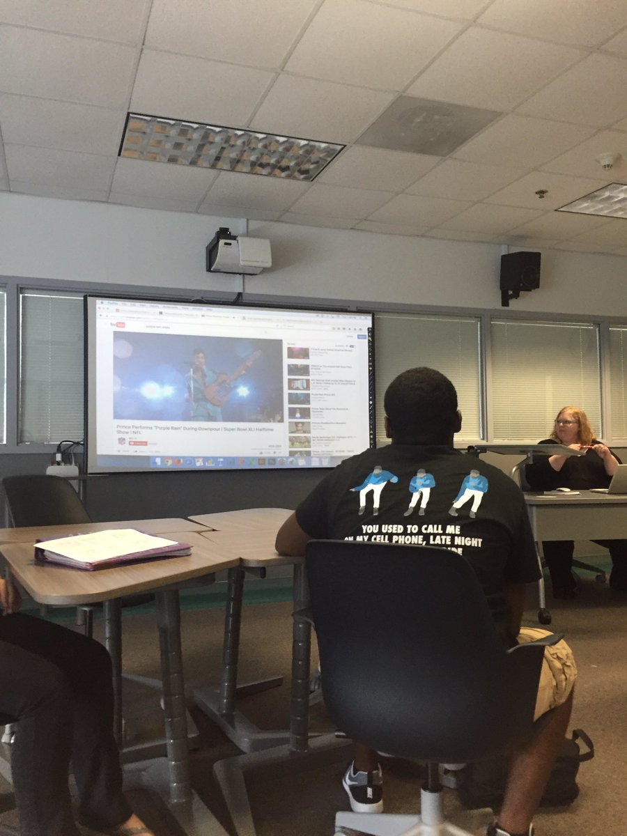 OchoK_'s tweet photo. Discussing breaking news in #COM425 by watching Prince's Super Bowl performance. The important things, obviously. https://t.co/zA5ItdoIMO