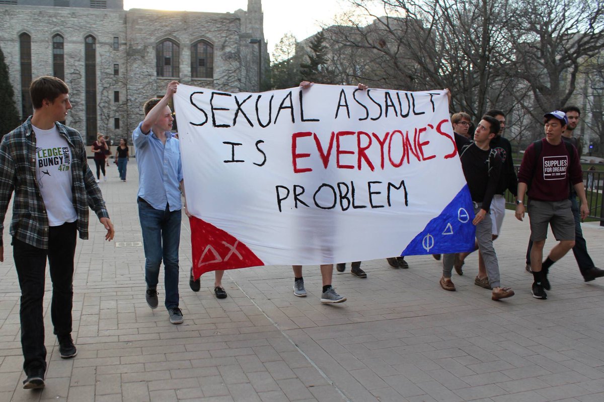 Delta Chi brothers march in Take Back the Night with <a href="/PhiDeltNU/">NU Phi Delta Theta</a>