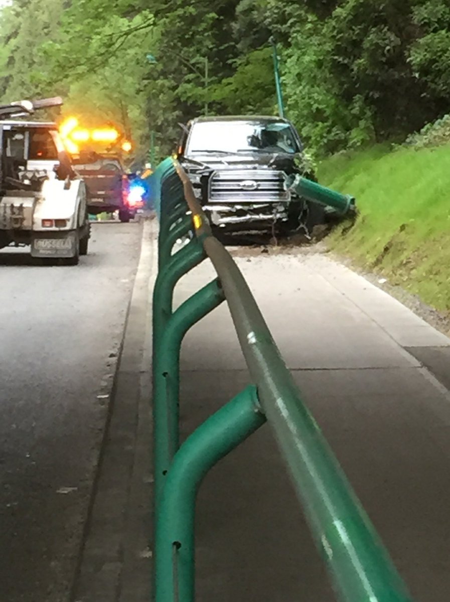 WVPDTrafficUnit's tweet photo. #Collision #LionsGateBridge truck launched into bike path. Traffic moving @AM730Traffic @NEWS1130Traffic @DriveBC https://t.co/bLlzkdG01H