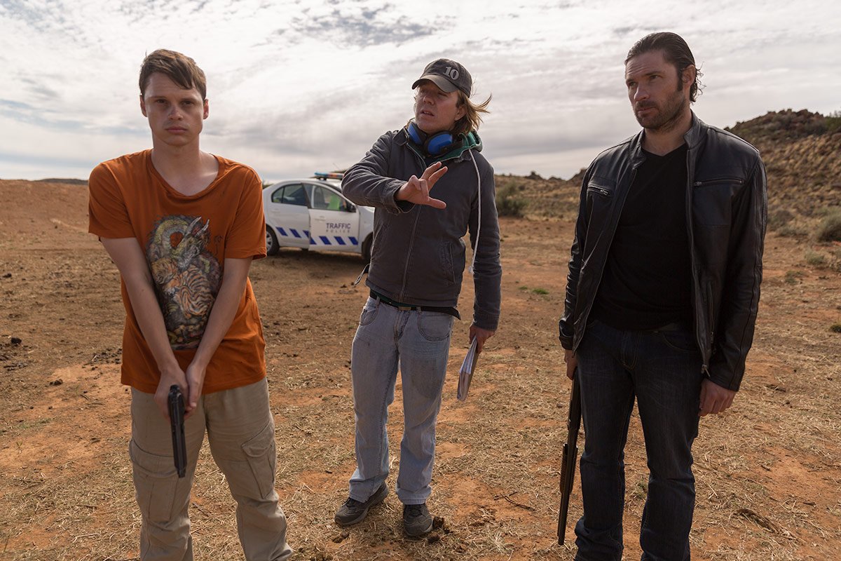 KarooFilms's tweet photo. Director @Byron_Davis setting up a tense scene with @Luanrunningwild and @neelsvjaarsveld for #JAGVELD https://t.co/EUECFLQu1W