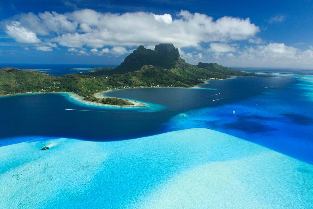 Tripadvisor's tweet photo. Bora Bora was named a top #TravelersChoice island this year! RT if you want to visit! https://t.co/RE7y0Z5cCn