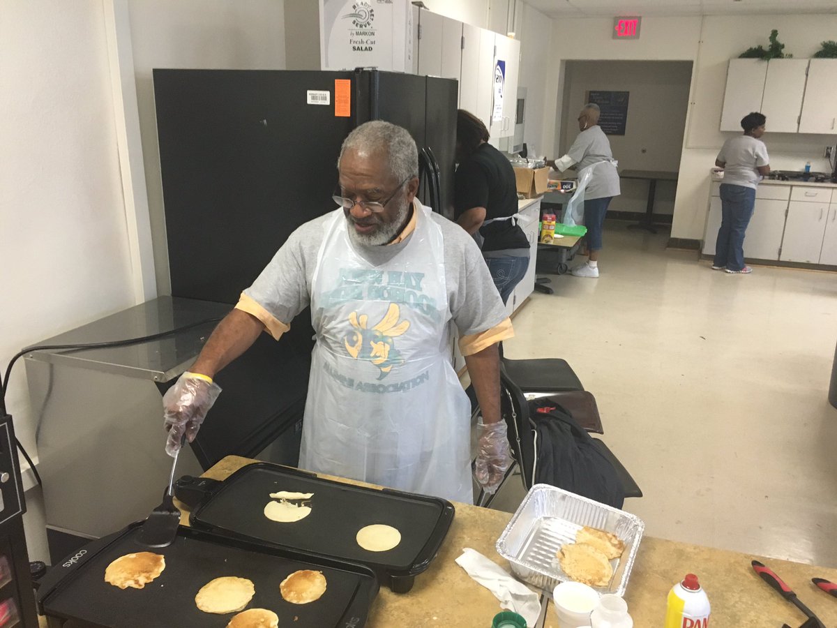 CLEMetroSchools's tweet photo. The John Hay Alumni Association celebrates the senior class with a pancake breakfast. https://t.co/rb9fP3DR8n