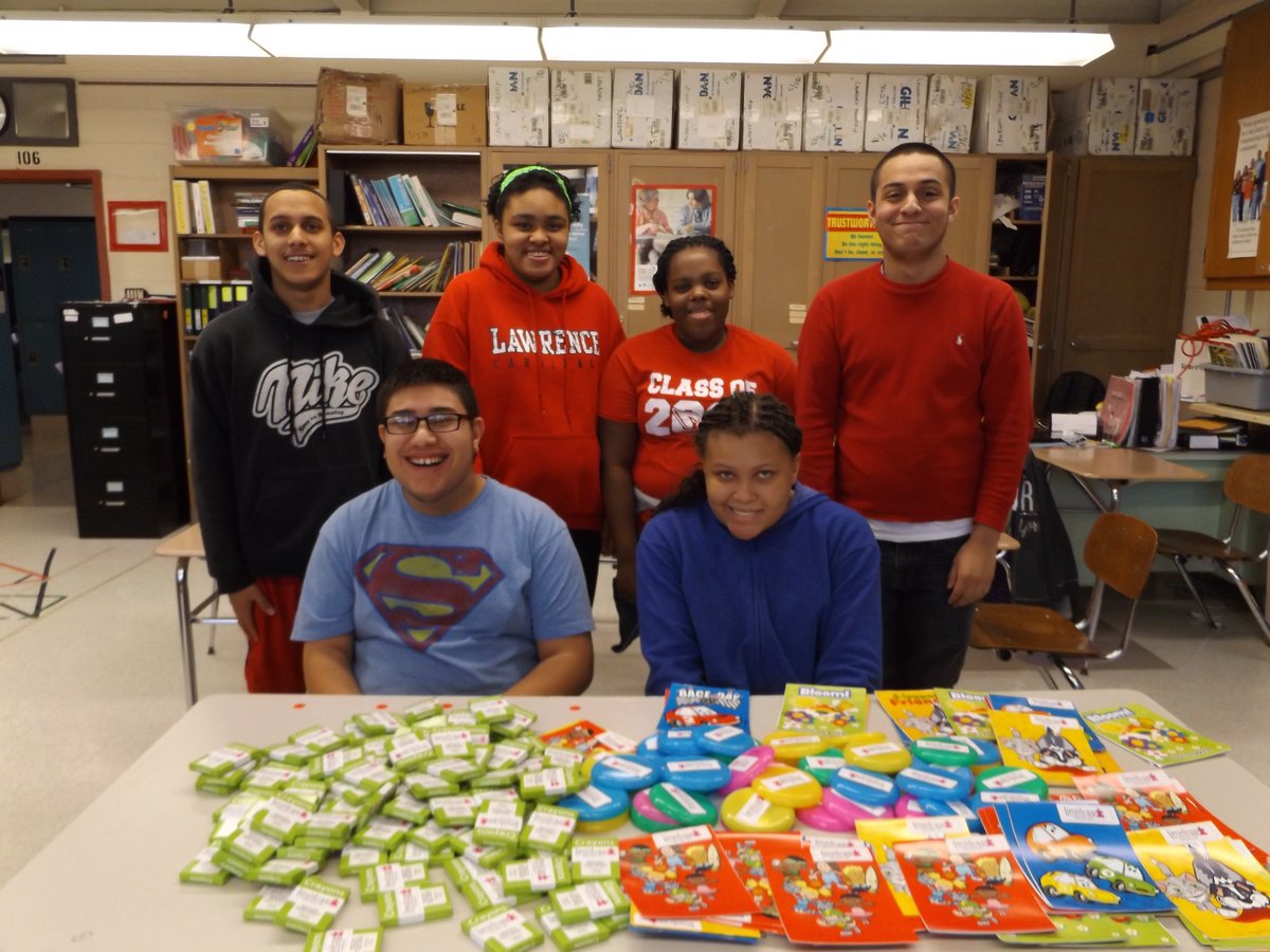 Future and current LHS Transition Services student workers prepared various product giveaways for a local business