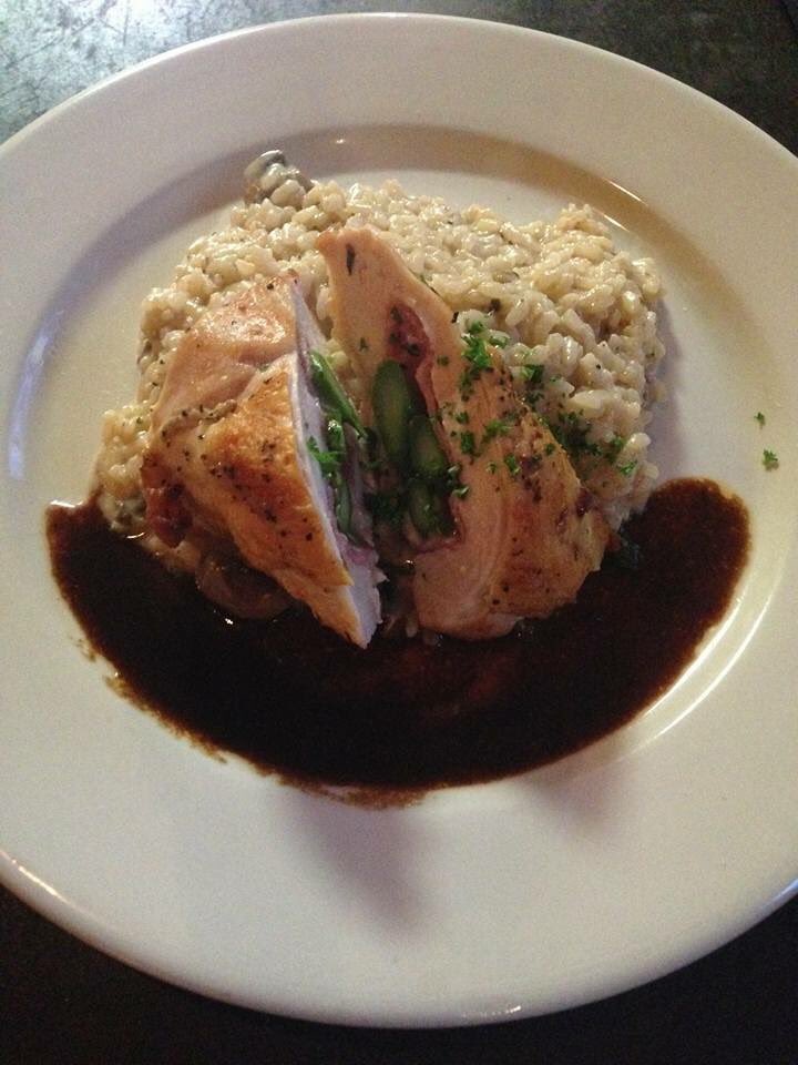 Chicken breast stuffed with prosciutto, fontina, and asparagus on a bed of parmesan risotto tonight <a href="/pastaprego/">Matthew Miersch</a>!