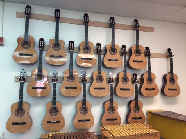 The new guitars are hung! One of this years projects was new equipment for our music class. #keepmusicinschool
