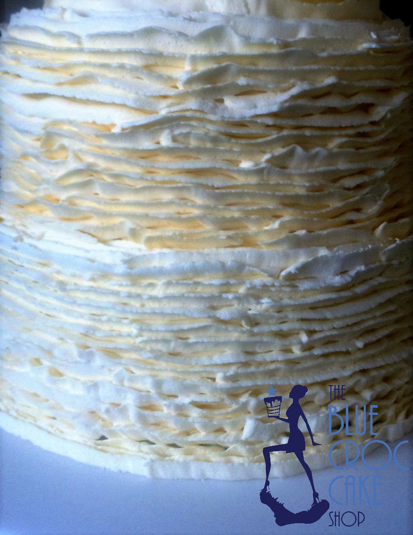 BlueCrocCake's tweet photo. Simple yet beautiful. Tight butter cream ruffles #Wedding #Cake #Beautifulbride https://t.co/t5blZD2ERo