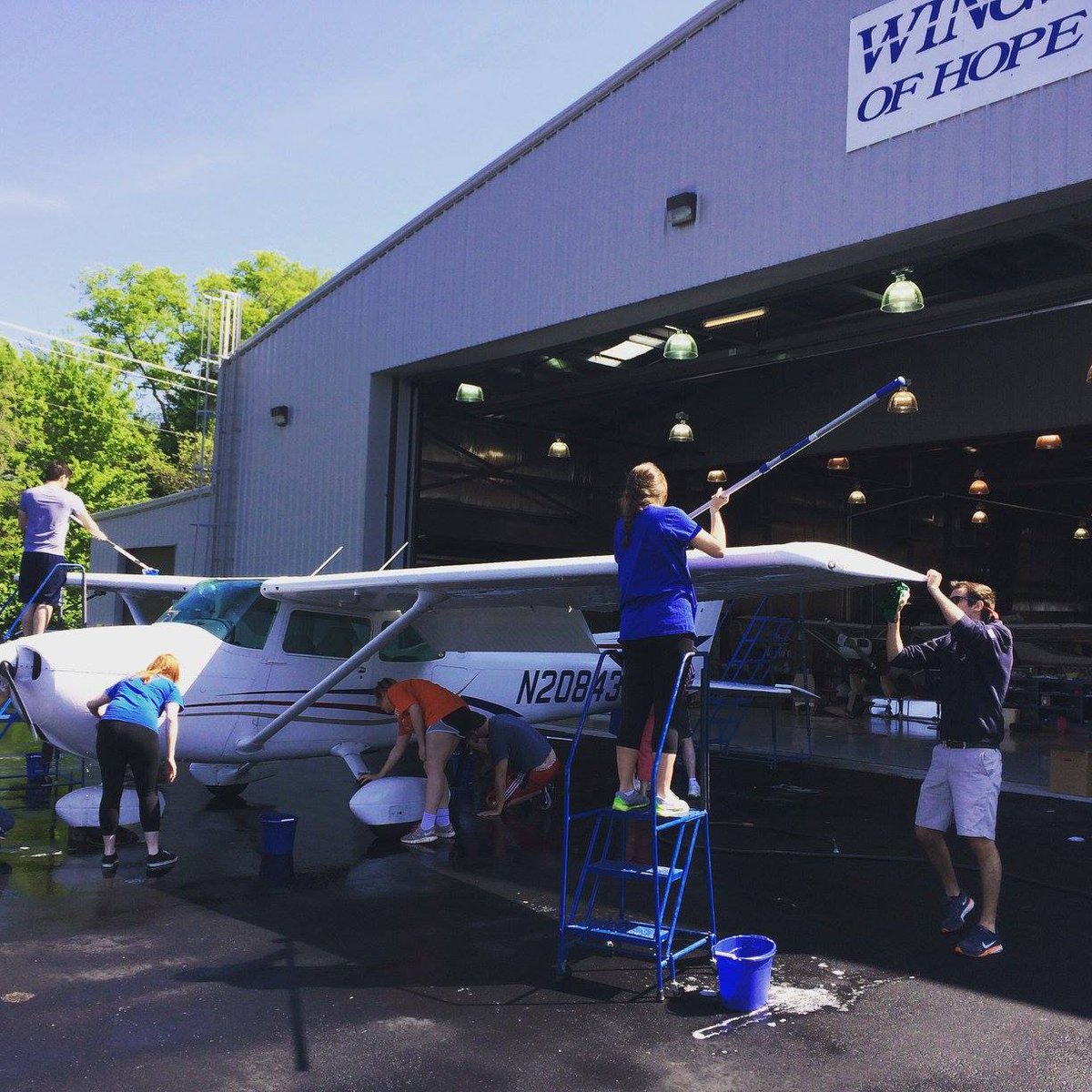 Great day for washing planes at Wings of Hope! Thx to Alpha Eta Rho SLU chapter, Young Ambassadors & volunteer crew!