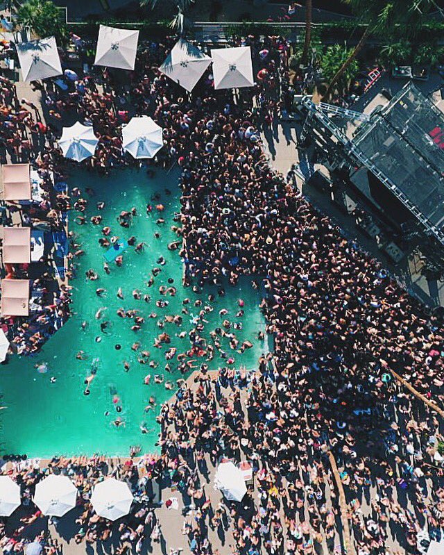 Skrillex's tweet image. Palm Springs pool party was so lit 🙏🏻🔥