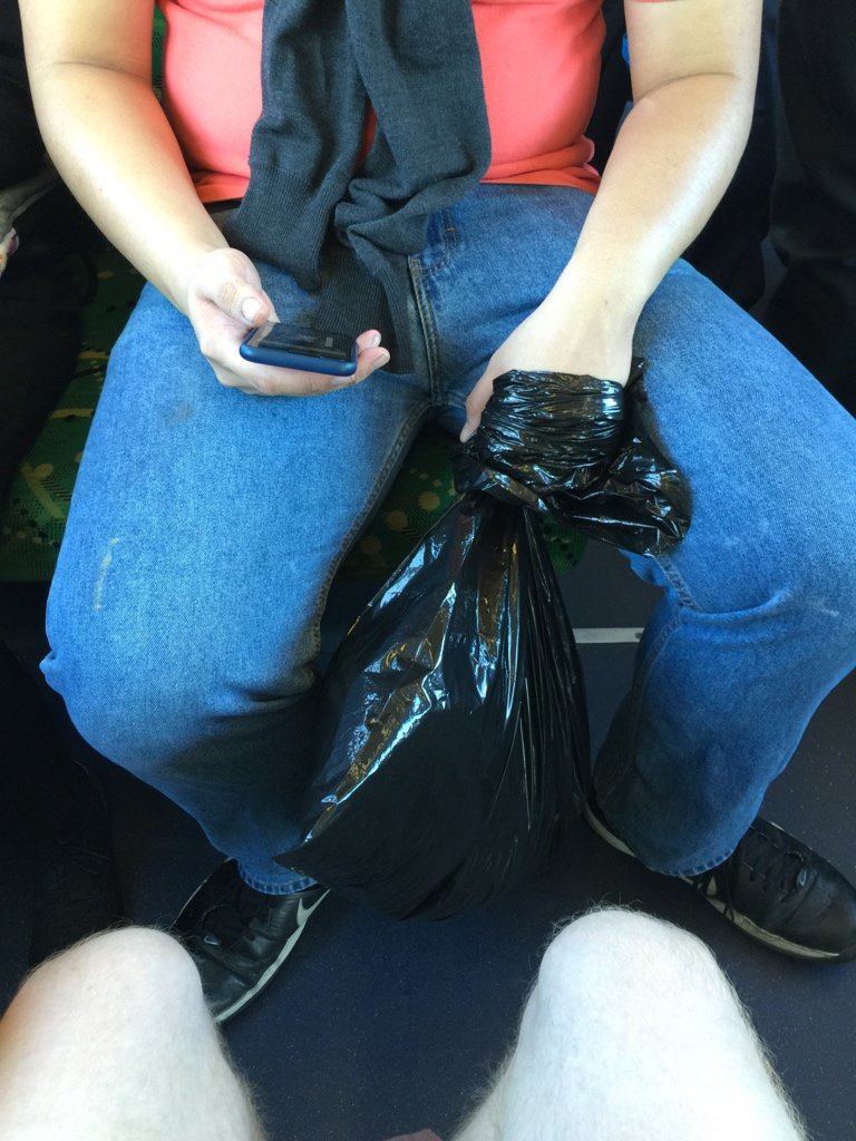 johnlderry's tweet image. On the tram, smells like that bag opposite is full of octopus. We're not in Hong Kong #octopuscard