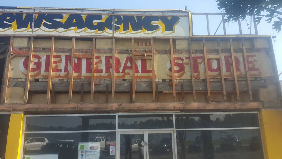 Old #NedKellyBargains demolition shows historic facade dated 1885. #BatemansBay #FrancisGuy bit.ly/23AukiC