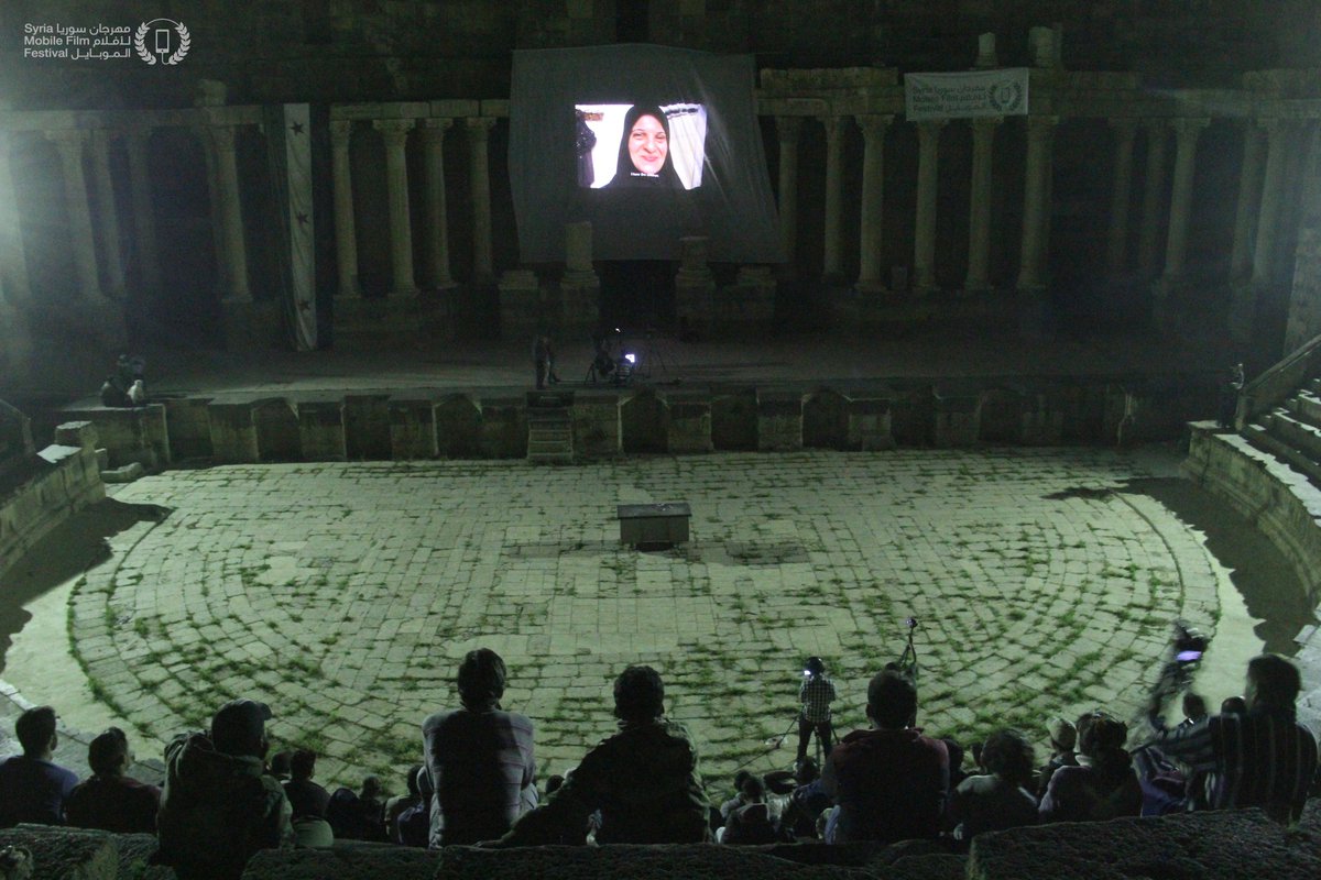 MPFFSY's tweet photo. لا نعرض في مسارحنا الفن للجنود الروس... 
في مدرج بصرى التاريخي، السينما للشعب السوري. 
#Syria #تدمر #حلب #سينما #فن https://t.co/GIzU33YS5j