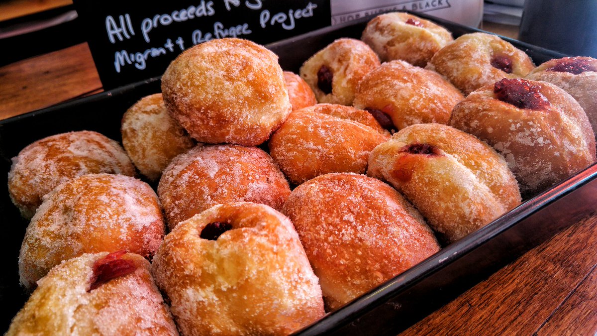 hopburnsblack's tweet photo. Doughnuts are here! £2, all proceeds to Southwark Refugee &amp; MigrantProject. We've taste-tested them, they're awesome https://t.co/nwFoyp5osP