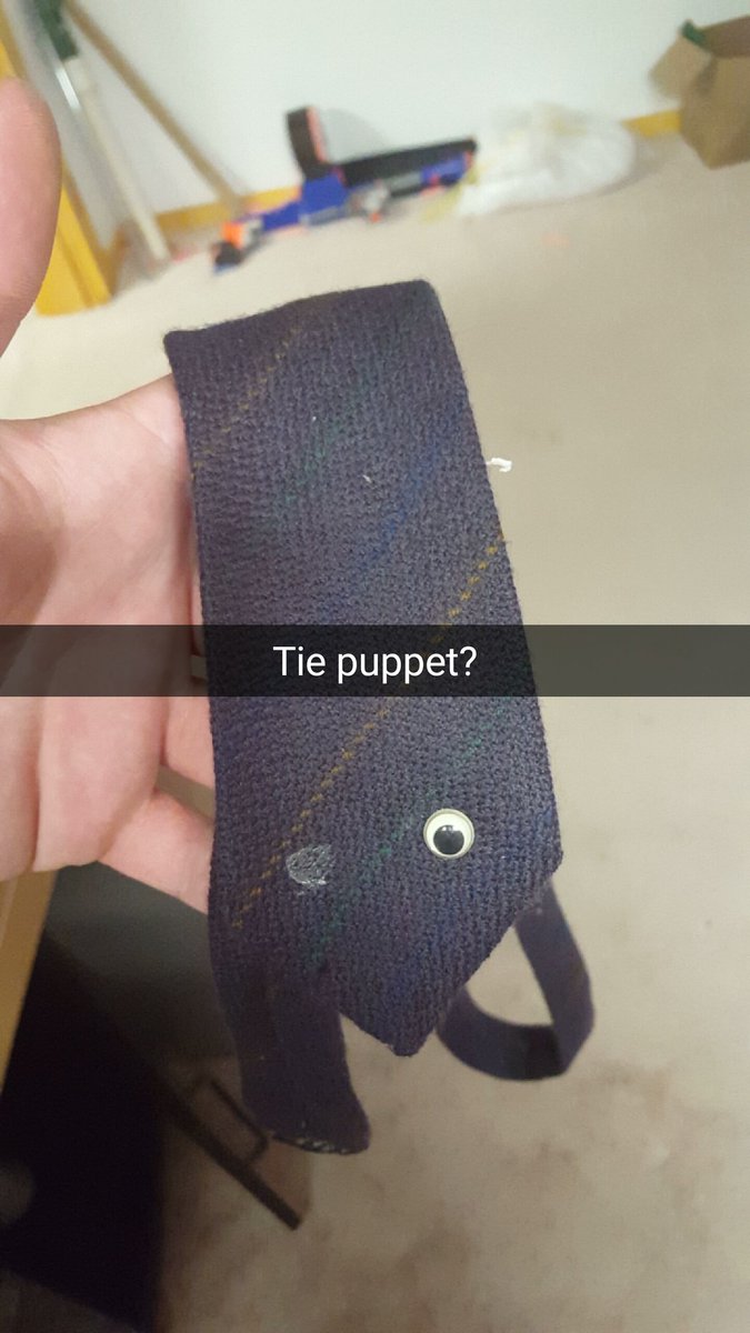 devin_cherry's tweet photo. Cleaning out my closet at my parents reveals hidden wonders.... #tiepuppet #oldartsandcrafts https://t.co/fiDQYfOTnK