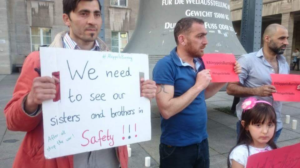 aleppoisburning's tweet photo. #BOCHUM #Germany "We need 2 see our brothers & sisters in SAFETY" #WorldwideREDProtest #AleppoIsBurning #AssadMustGo https://t.co/h5iv2AoruR