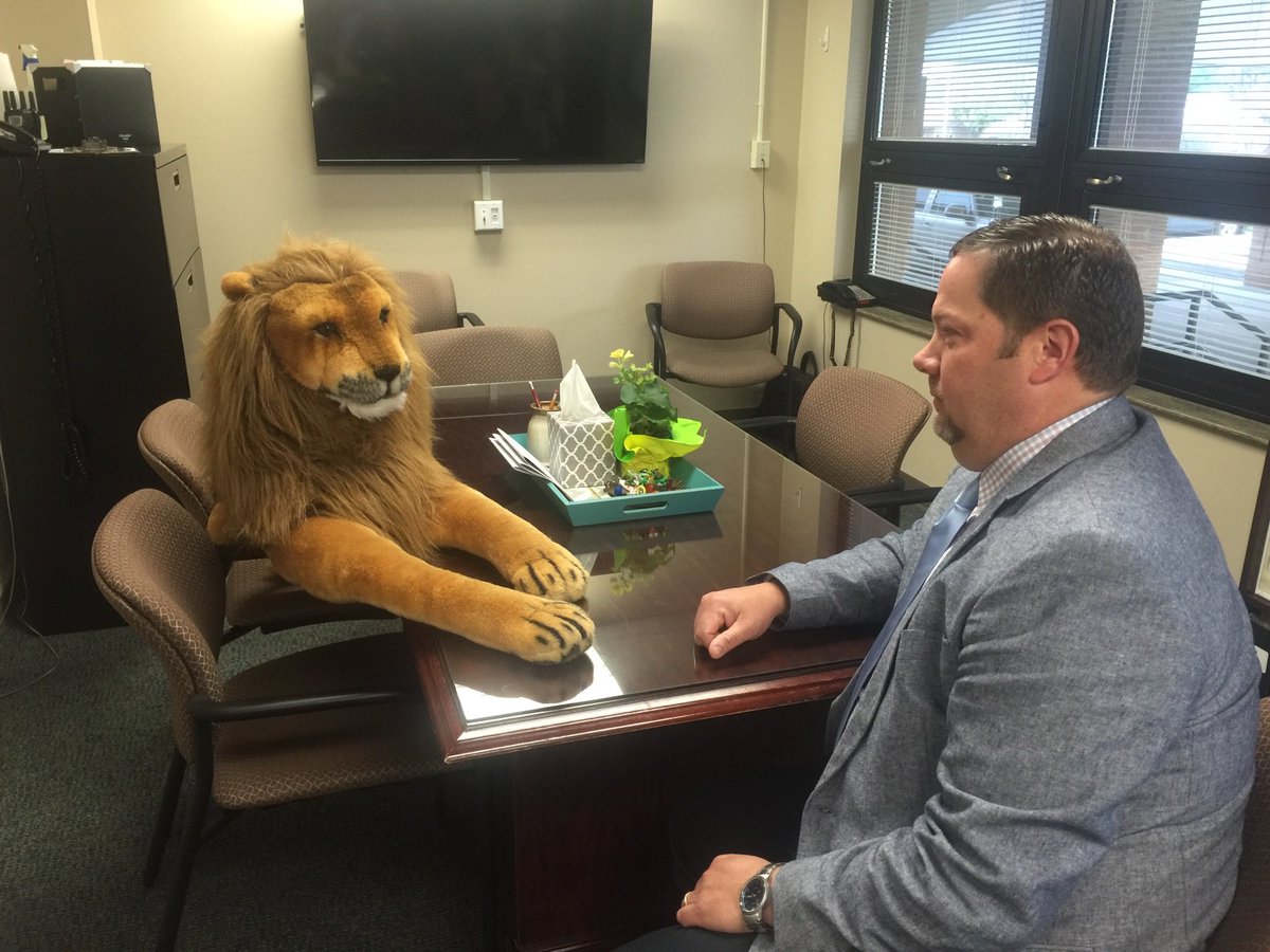 Mr. Terrill met Leo. I think they had a great visit! #lionsrock