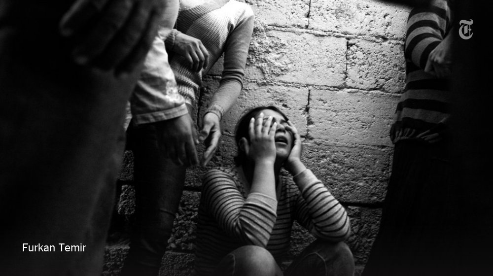 nytimes's tweet photo. A young Turkish photographer ditched school and traveled to the border with Syria https://t.co/7bn22rZCKS https://t.co/Z8gAHXvU69