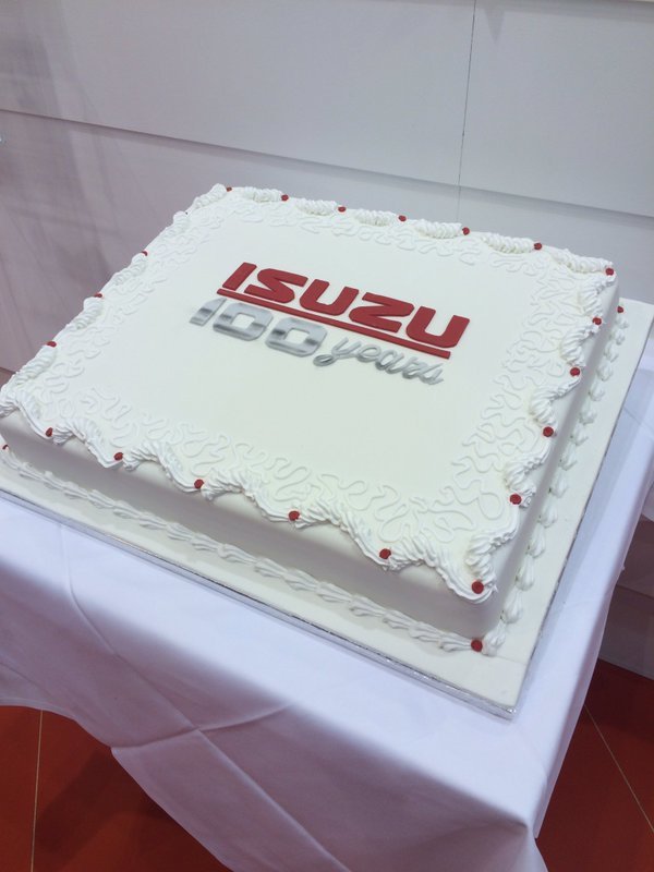 Isuzuuk's tweet photo. #IsuzuUK, celebrating 100 years in style at the #CVShow2016. Who wants some cake? https://t.co/k6zPbysLF8
