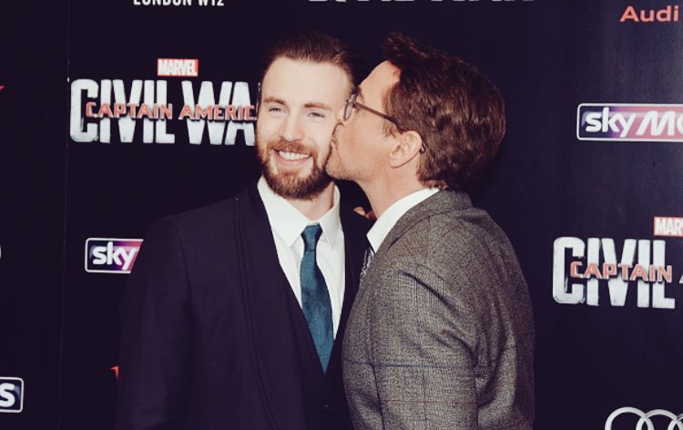 AmazingRDJ's tweet photo. Robert Downey Jr. kisses Chris Evans at the London premiere of Captain America: Civil War (April 26, 2016). https://t.co/cCL0y9XgNV