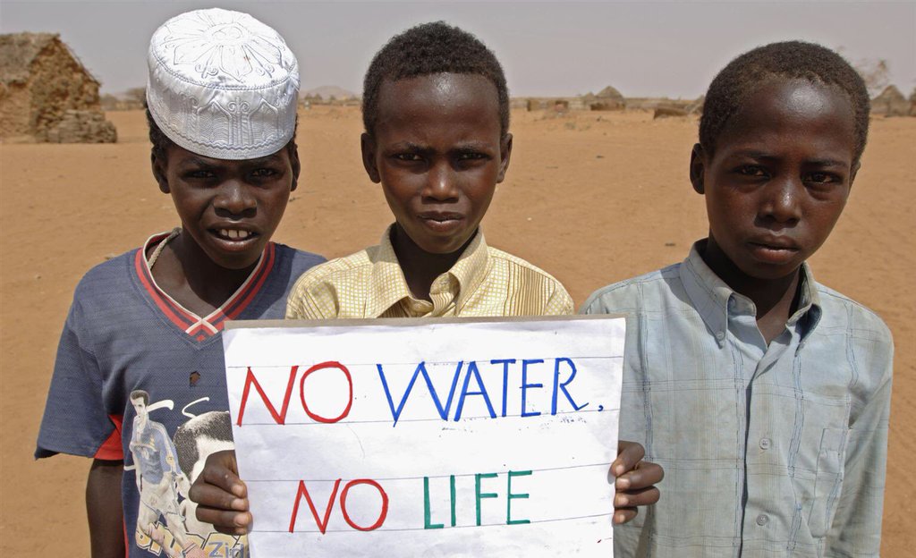 UNICEF's tweet photo. For these boys in Sudan, #wateris life. The region suffers from extreme drought @UNICEFWater https://t.co/uuuowwbcKS