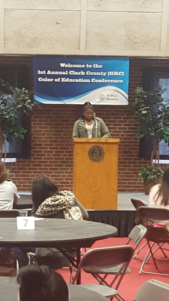 Student leader introducing the guest speaker