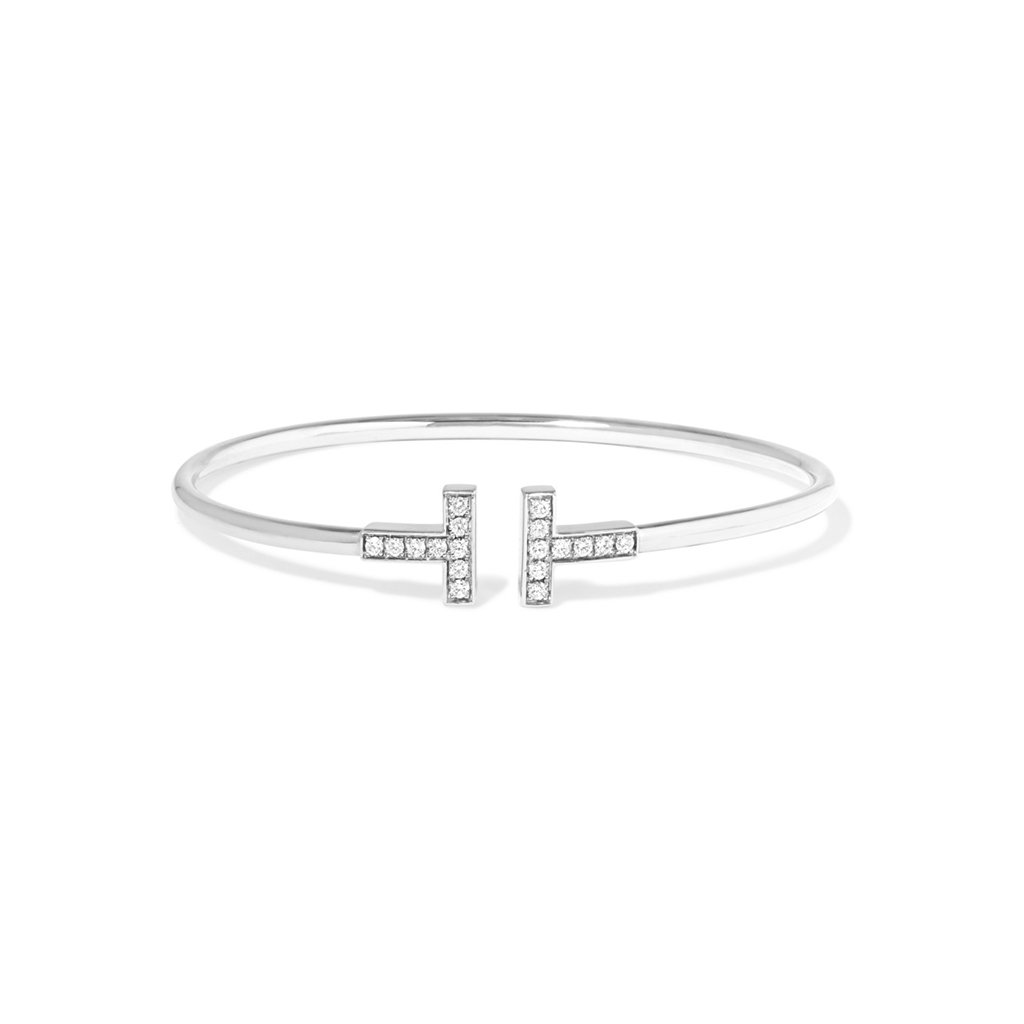 NETAPORTER's tweet photo. Get your look #downtoaT with @TiffanyAndCo's #NYC-inspired #jewelry collection, new today at https://t.co/pLvlkwQQSH https://t.co/3I70EJMhw3