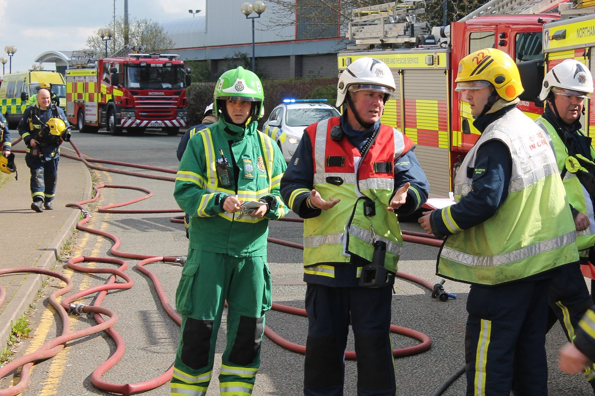 EMASNHSTrust's tweet photo. #EMASHART team (pictured in green) working with @northantsfire @NorthantsPolice at large training exercise #Team999 https://t.co/SlOKll2DBk