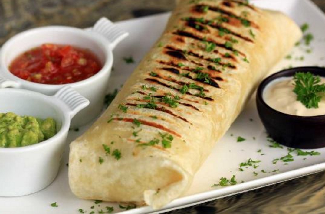 BurritoBeach's tweet photo. Try to turn this burrito down, we dare you! #EEEEEATS #toastedperfection https://t.co/3P9BRWpQVa