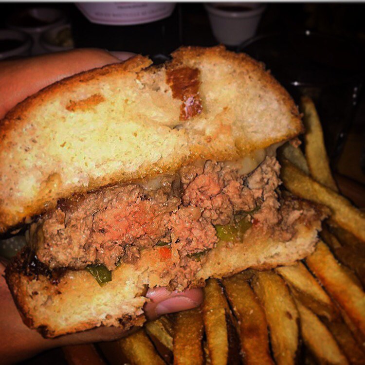 It’s happy hour! You can get a burger, a beer, and a shot, for $15! The struggle can be a little less real.