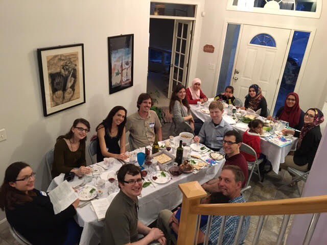 TampaJew's tweet photo. First Syrian Refugees share a Passover Seder w/ Jewish family in KC! #surgeprogram @POTUS @FLOTUS @JohnKerry https://t.co/jB5qfKlWHH