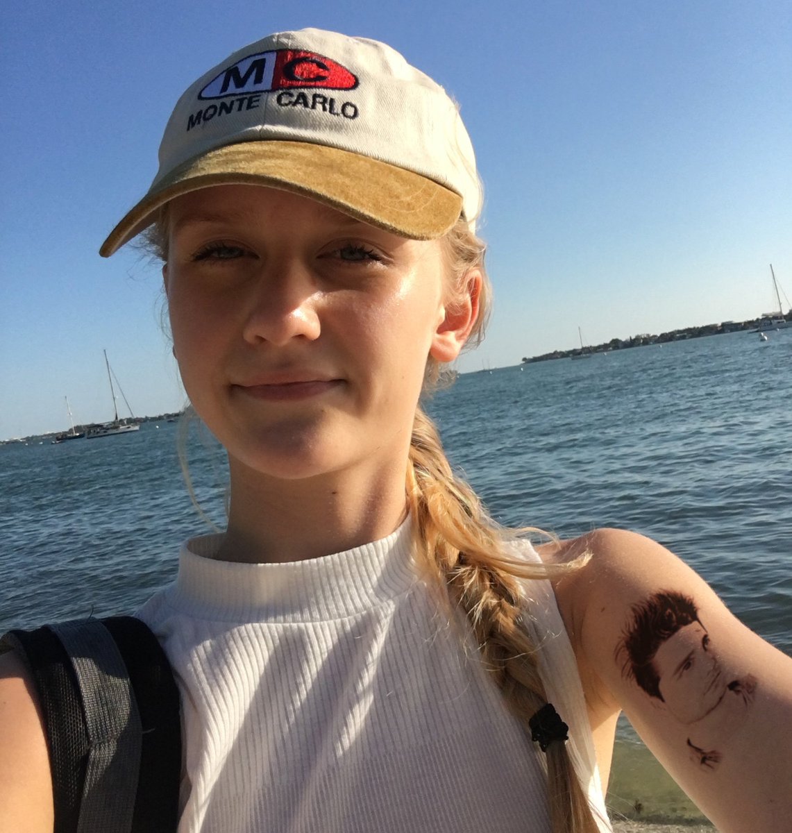 michaeljohnson's tweet photo. @bastilledan My daughter is SO excited to see you tomorrow at Sunfest that she got a tattoo of your face on her arm https://t.co/HWWTmuAPbx