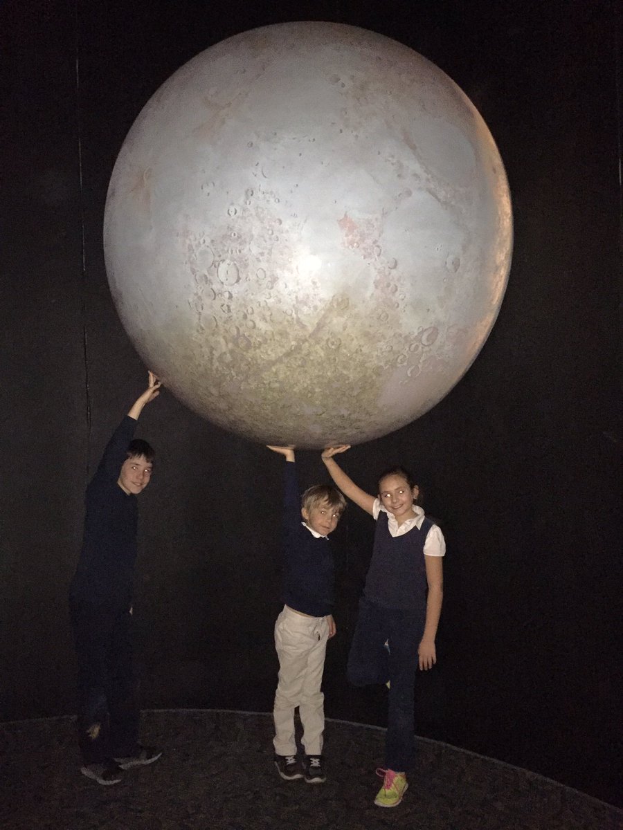 BarbieBking's tweet photo. Holding up the moon at the planetarium. @ACSRochester @rocRMSC https://t.co/fCxJD9sMVr