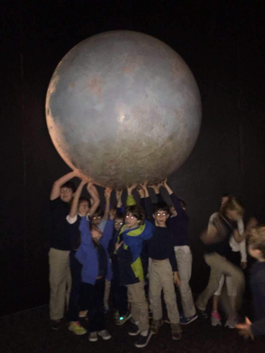 BarbieBking's tweet photo. Holding up the moon at the planetarium. @ACSRochester @rocRMSC https://t.co/fCxJD9sMVr