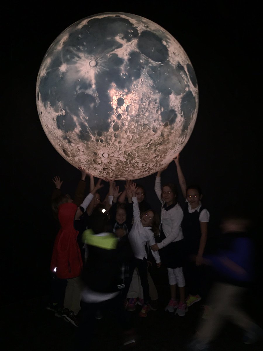 BarbieBking's tweet photo. Holding up the moon at the planetarium. @ACSRochester @rocRMSC https://t.co/fCxJD9sMVr
