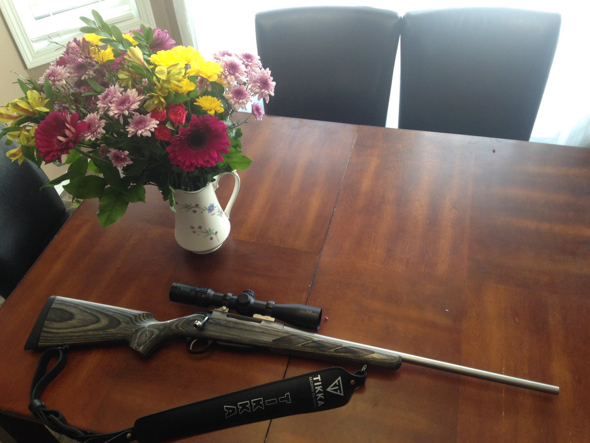My husband knows the key to my heart. Flowers and a new rifle. Best anniversary present ever! @TMillsapOutdoor