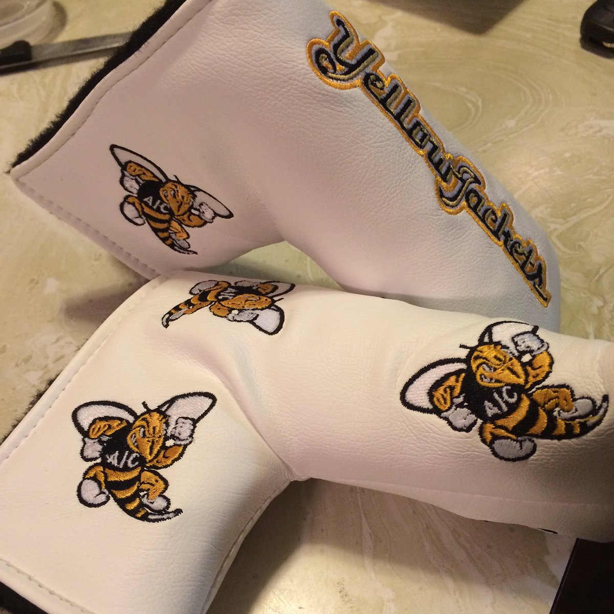 ChasesDad2018's tweet photo. Hey @GOLF_AIC alumni/fans, stop by Butova Gym and pick up your awesome Yellow Jacket putter covers! https://t.co/1yYt0YkYZI