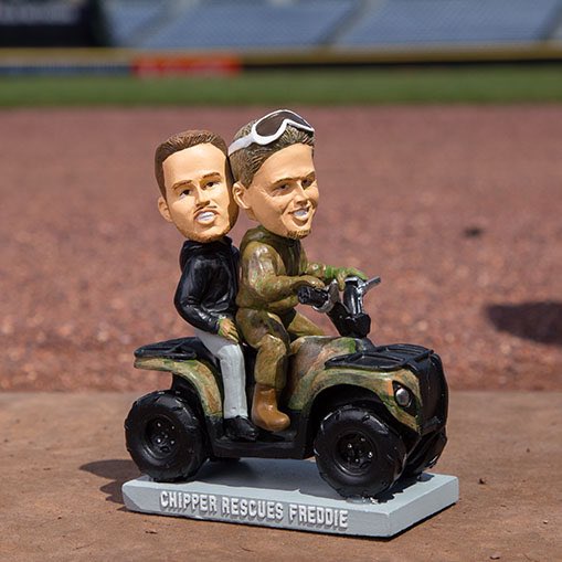 Braves's tweet photo. Chipper: 🎶 "I can be your hero, Freddie."🎶 (probably)

Chipper rescues Freddie bobblehead, May 28th! https://t.co/Q60O3Sl4Ft
