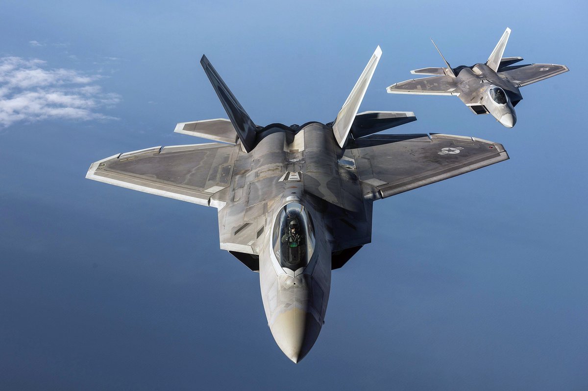 DeptofWar's tweet photo. .@usairforce #F22 Raptors fly over the #BalticSea. https://t.co/YyRvq07A23