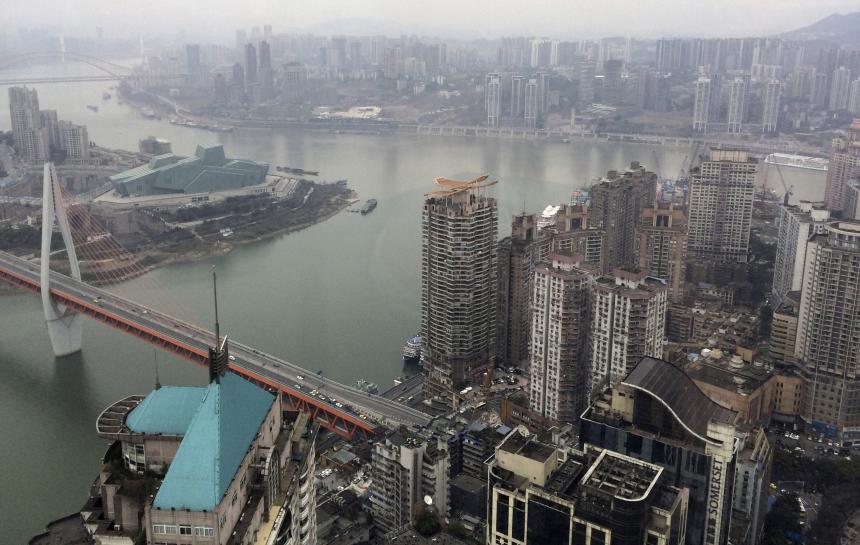 Reuters's tweet image. Chinese cities dive back into debt to fuel growth even as defaults rise reut.rs/1NZJUwY